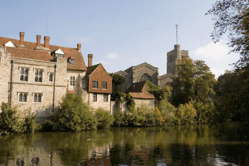 Archbishop’s Palace and riverside buildings surrounded by greenery, reflecting the heritage and calm of the wider Maidstone and Loose community.